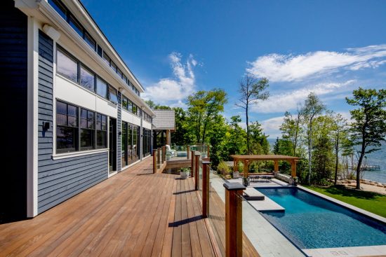 Normerica-Timber-Homes-Timber-Frame-Portfolio-Beachside-Bliss-Exterior-Pool-Deck-Glass-Railing