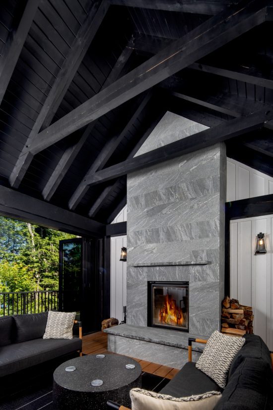 lakeside-cottage-modern-style-bungalow-portfolio-2022-4-monochrome-cool-Normerica-Timber-Frame-cottage-muskoka-room-fireplace-2