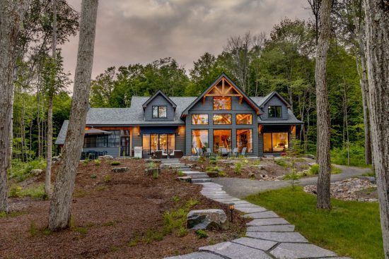 Lakeside Cottage Family Cottage Luxury Retreat Great Room Build Cottage Portfolio Project Normerica Timber Frame Homes Exterior Stone Walkway