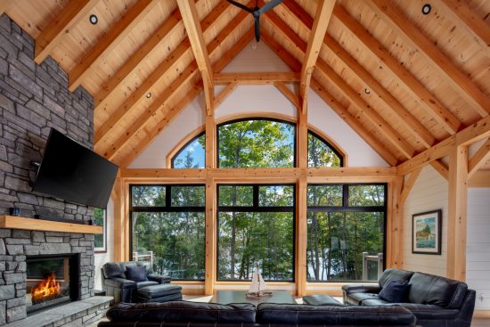 modern bungalow house design lakeside cottage timber frame project Cottage Calm Normerica interior great room window wall