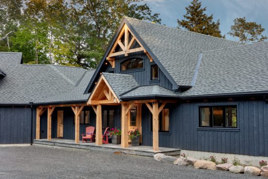 modern bungalow house design lakeside cottage timber frame project Cottage Calm Normerica exterior front entry 2