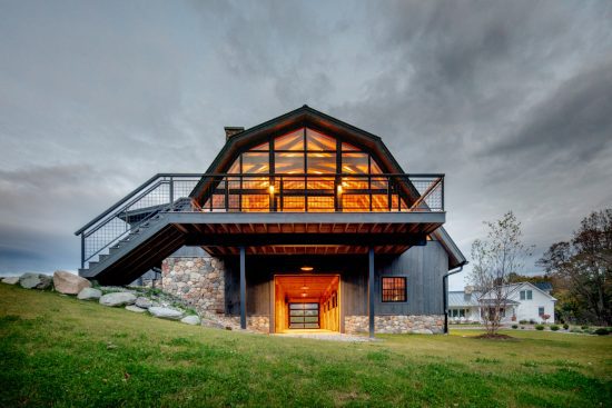 Timber Frame Barn House, Exterior, Night Window Trusses, Normerica Timber Homes